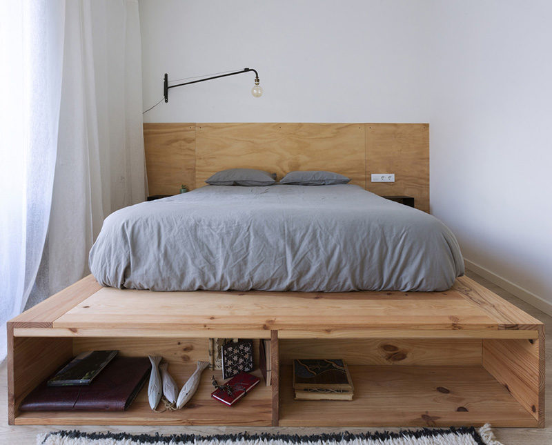 wooden double bed with headboard